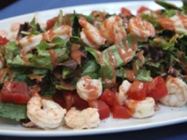 Shrimp over mixed greens