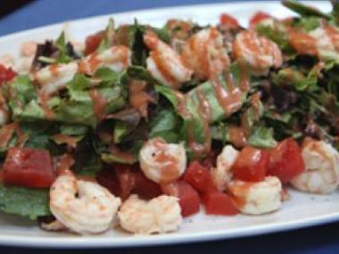 Shrimp over mixed greens