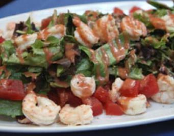 Shrimp over mixed greens