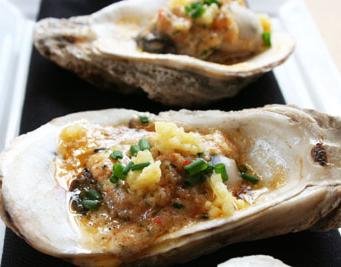 https://www.louisianaseafood.com/sites/default/files/styles/related_editorial/public/legacy_images/grilled_oyster-crop.jpg?itok=VxuxUkyY